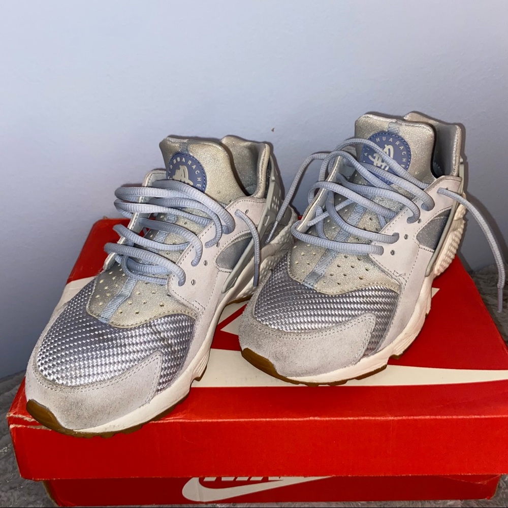 Grey and blue Nike huarache sneakers